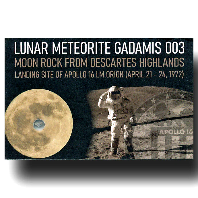 Business card size trading card containing a small fragment of the lunar meteorite Gadamis 003