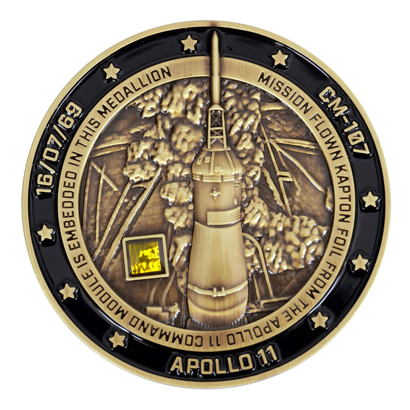 Apollo 11 medallion with large visible flown Kapton foil piece