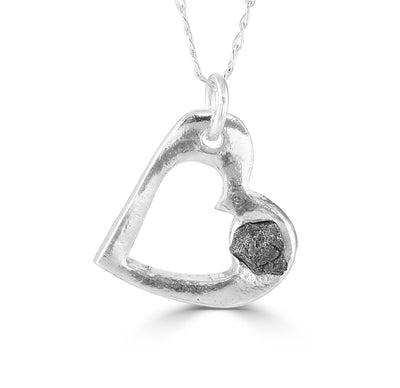 silver heart necklace with meteorite
