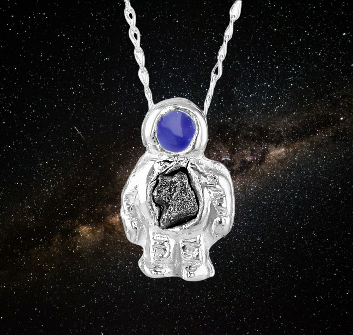 silver spaceman necklace with meteorite iron