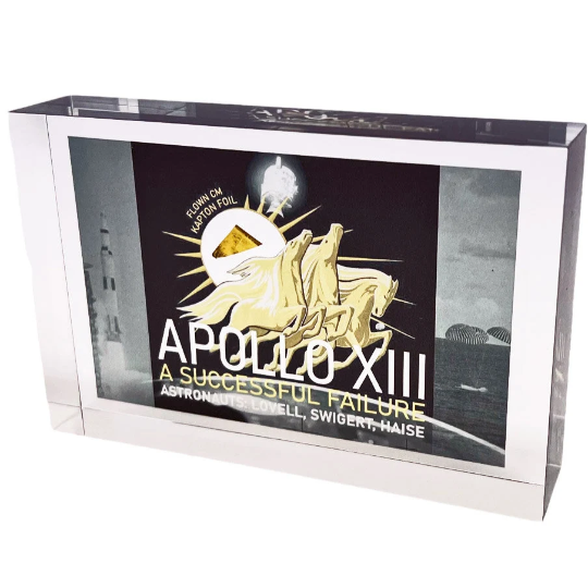 Acrylic block containing a flown piece of Kapton foil flown to the moon on Apollo 13
